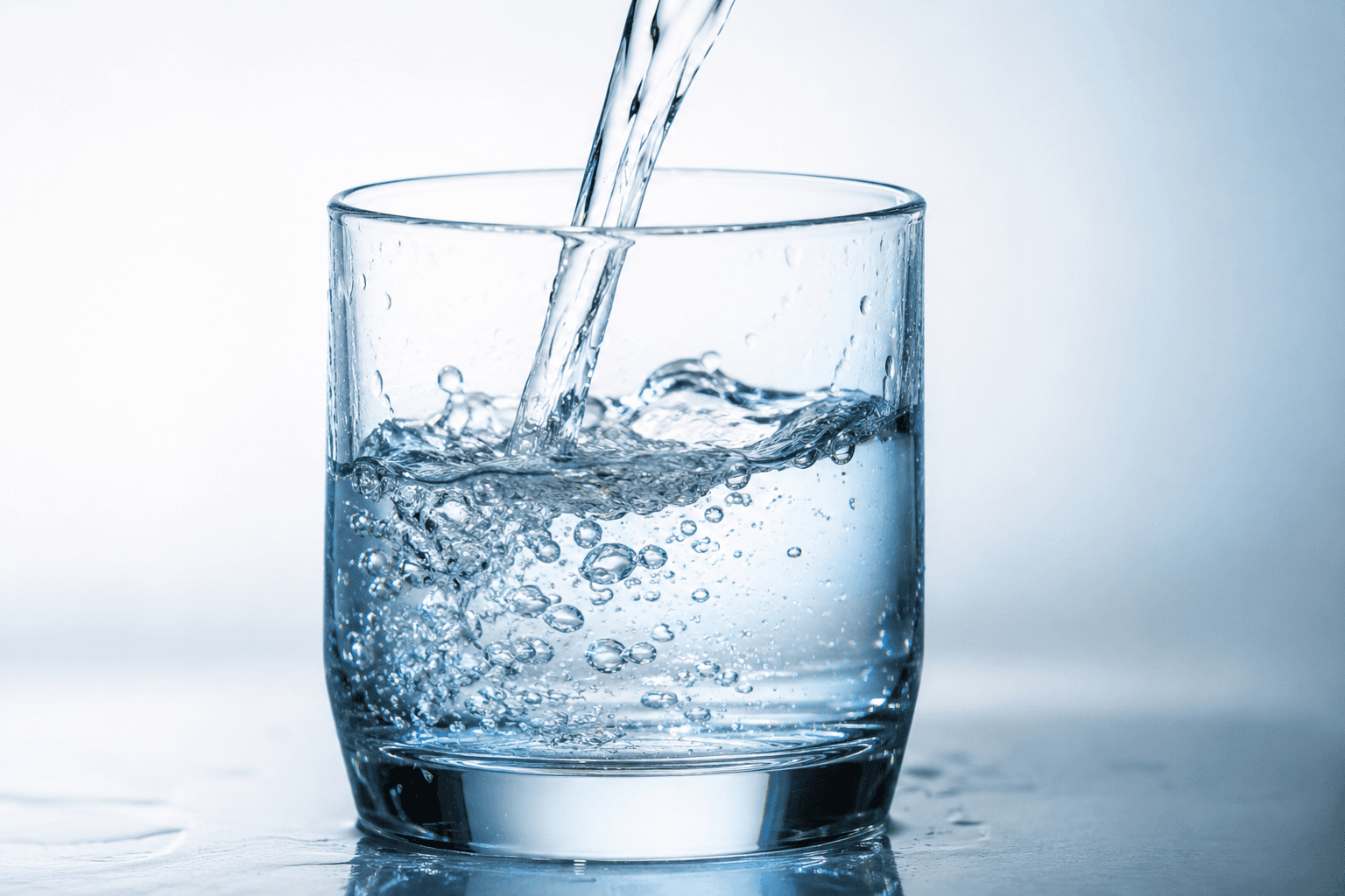 Water pouring into a glass