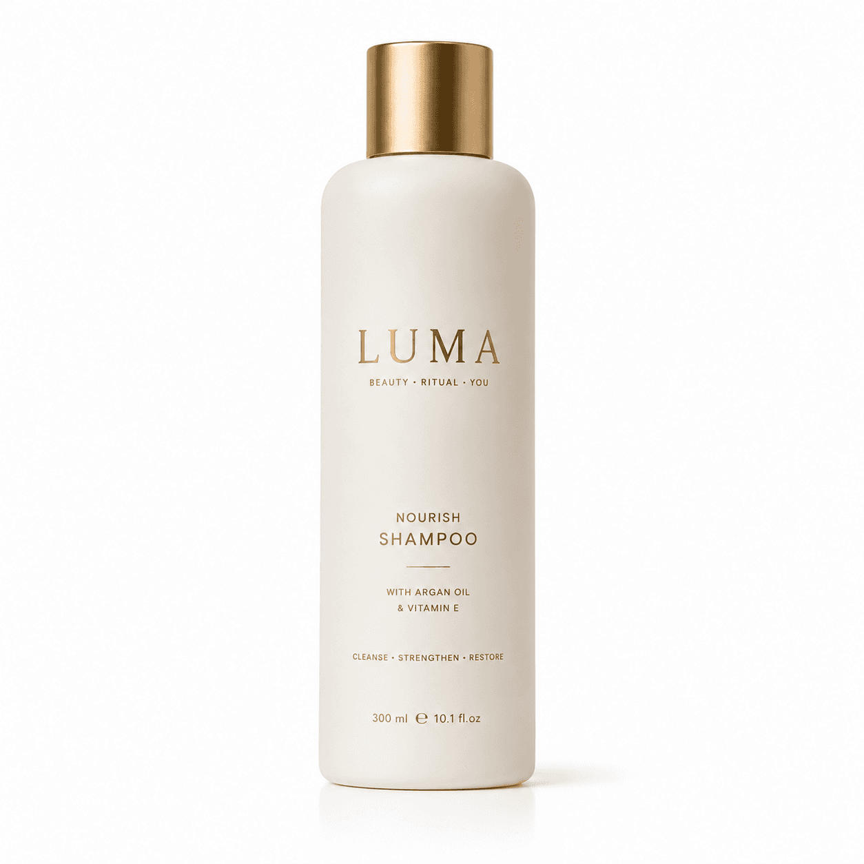 LUMA Nourish Shampoo bottle with a brushed gold cap