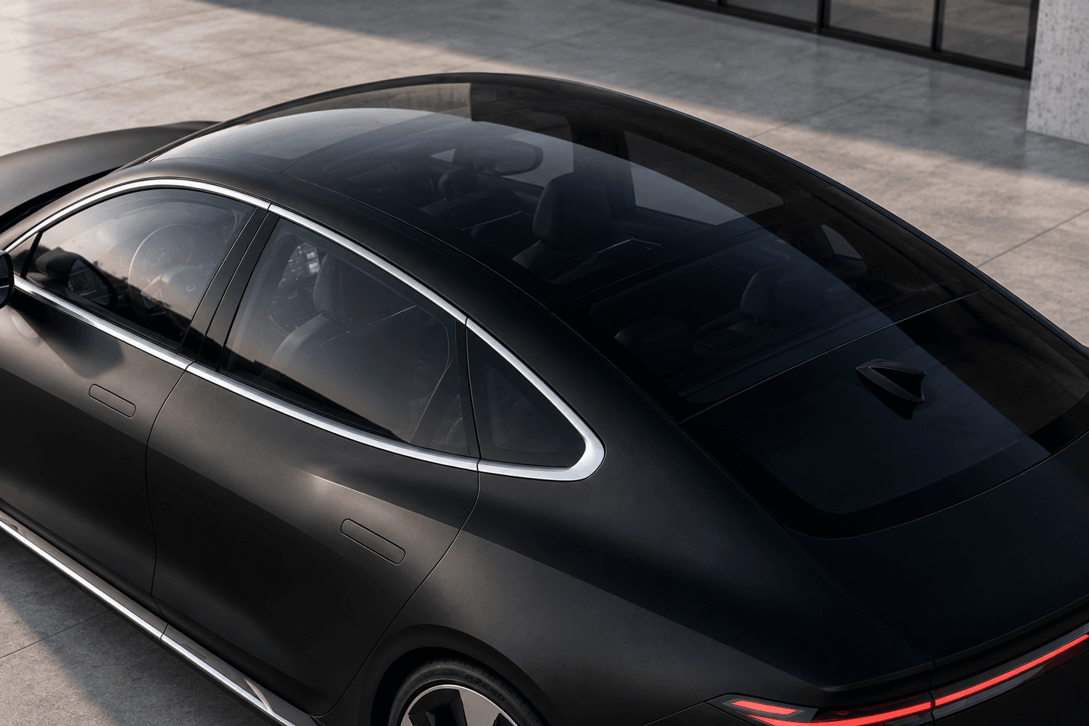 Velora sedan on an open road in daylight